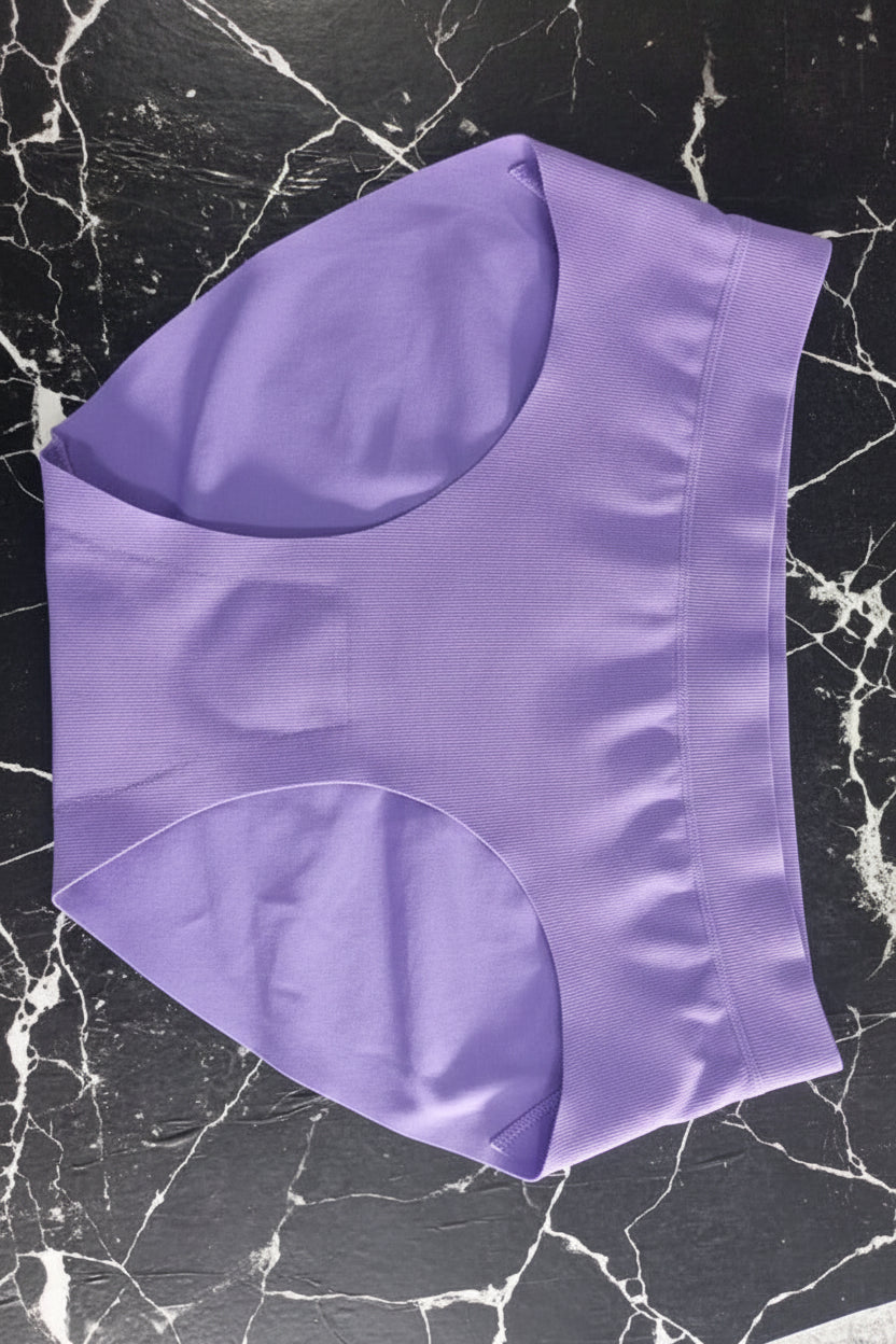 Purple fabric on a black marble surface