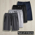 Pack of 4 shorts in gray, black, and navy on a white background